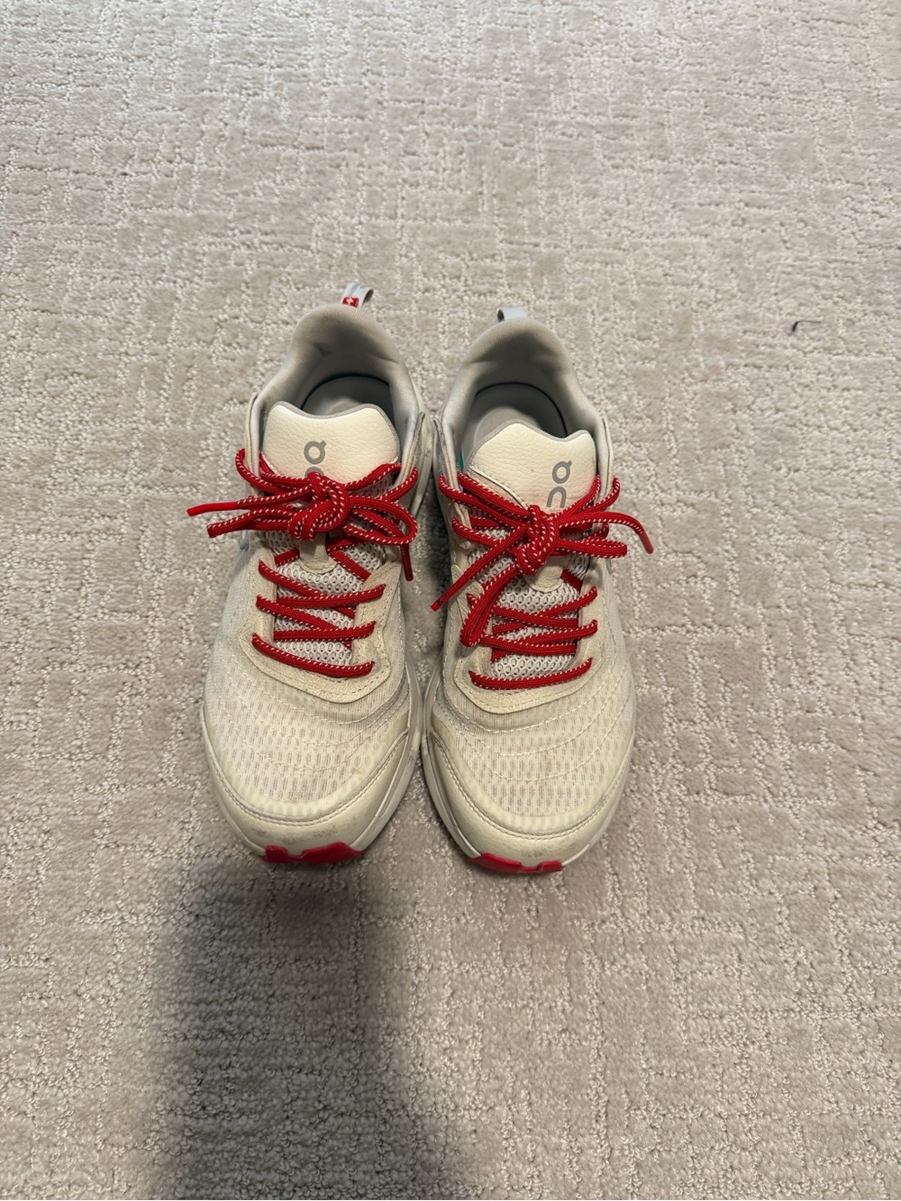 On Running Women's White Athletic Sneakers with Red Accents